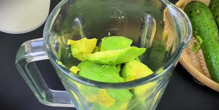 Combine the blended avocado with the milk and yogurt mixture. Do not add coconut milk yet.