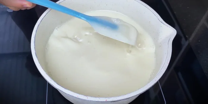 Remove from heat and stir in two jars of yogurt. Do not boil.