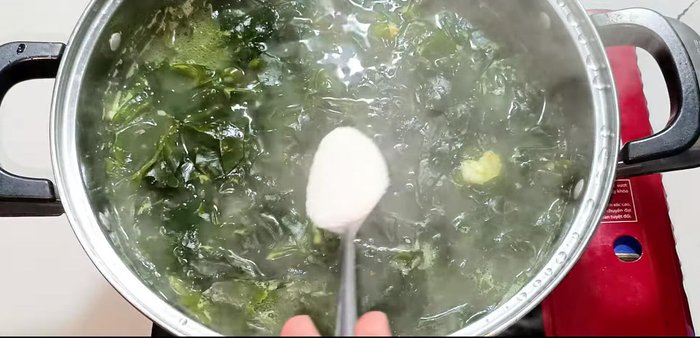 Reduce heat to low, season with sugar, MSG, and salt to taste. Add seasoning powder if needed. (342.639)