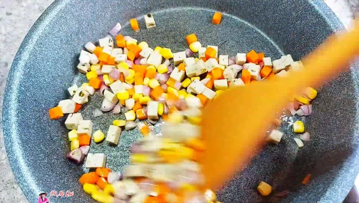 Season with sugar, vegetarian seasoning, and pepper. Stir to coat.