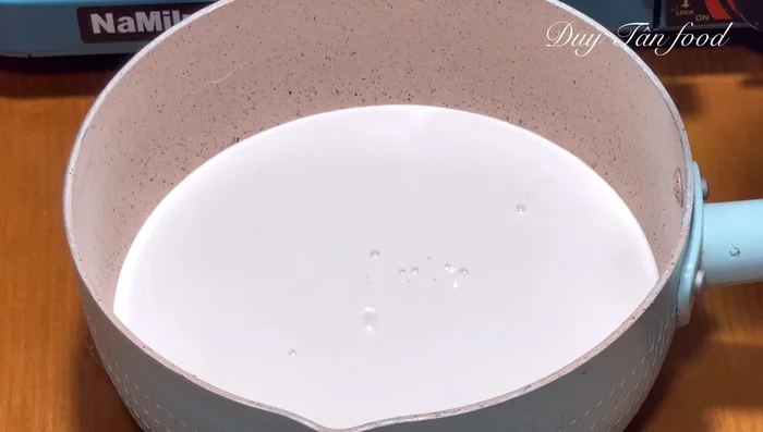 Prepare coconut milk sauce: Combine coconut milk, sugar, salt, and cornstarch/rice flour. Stir until dissolved.
