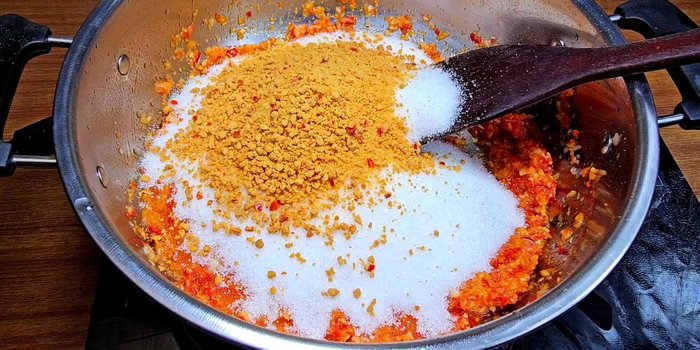 Add sugar and salt: Add sugar and salt to the pot and stir until combined.