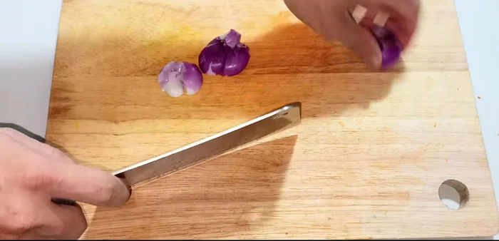 Prepare the shallots: Finely chop. (187.879)