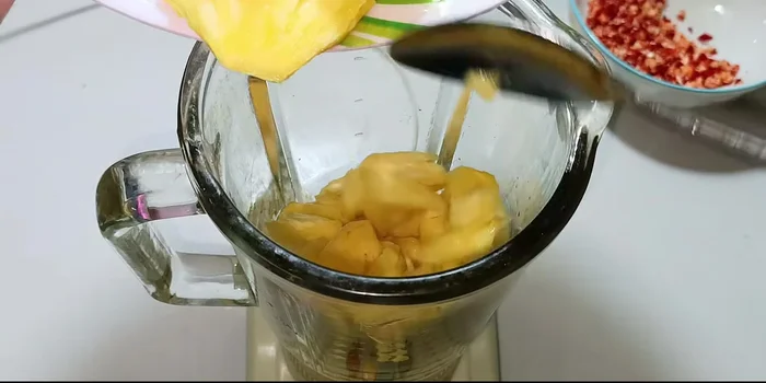 Blend the pineapple pieces with ½ cup of water until pureed (don't blend too smooth).