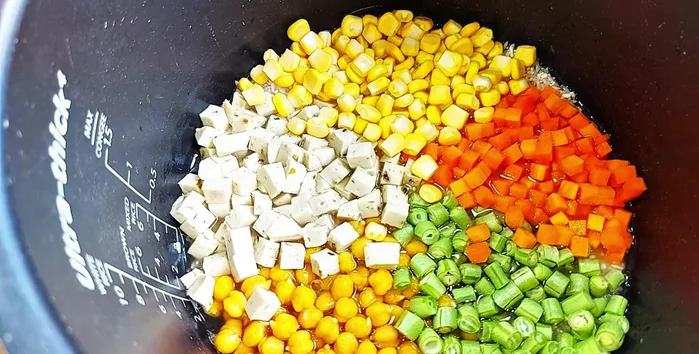 Press the cook button on your rice cooker.