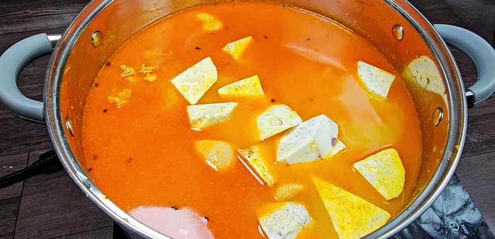 Add taro and cook: Add 300g of the chopped taro to the pot. Cook until soft. Remove some of the cooked taro, blend it until smooth, and return it to the pot for a richer broth.