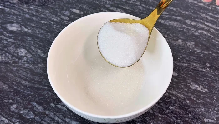 Prepare the fish sauce by mixing sugar, warm water, fish sauce, and chili garlic.