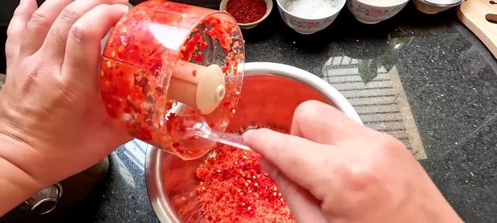 Combine the blended plums and chilies with coarse salt. Dry roast the mixture until dry, stirring frequently to prevent burning. (Note: Use low heat to avoid burning the plums).