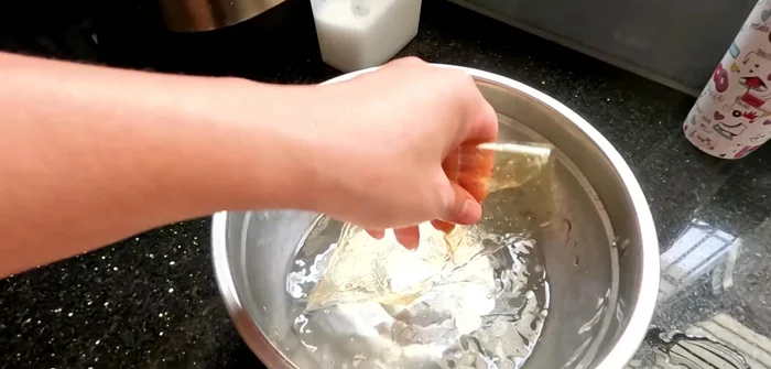 Soak gelatin sheets in water for 2-3 minutes, then drain.