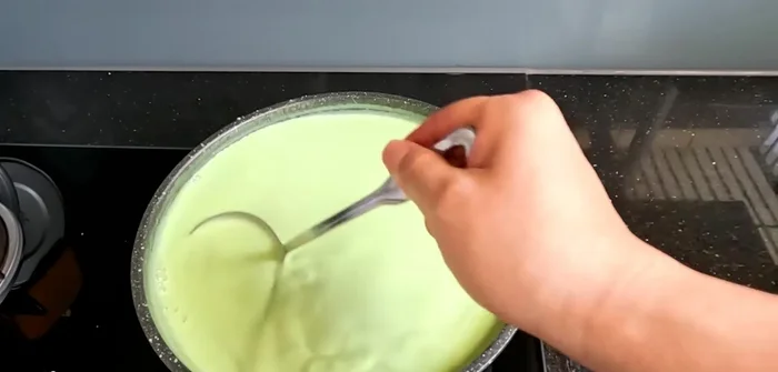 Cook the cream sauce over medium heat, stirring frequently, for 10-15 minutes until thickened.
