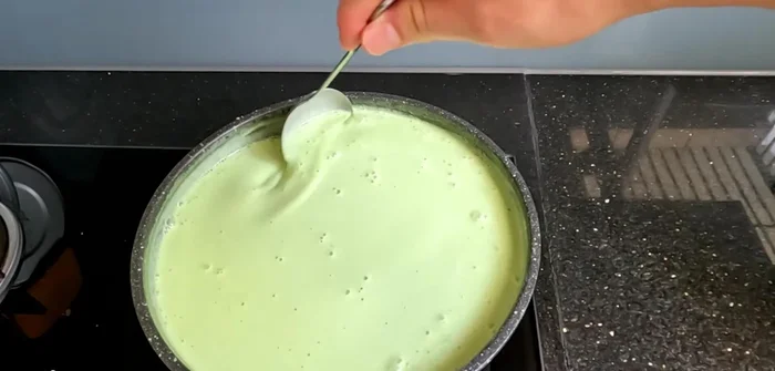 Remove from heat and let the cream sauce cool completely.