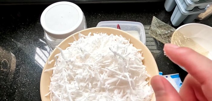 Shred the dried coconut flakes.