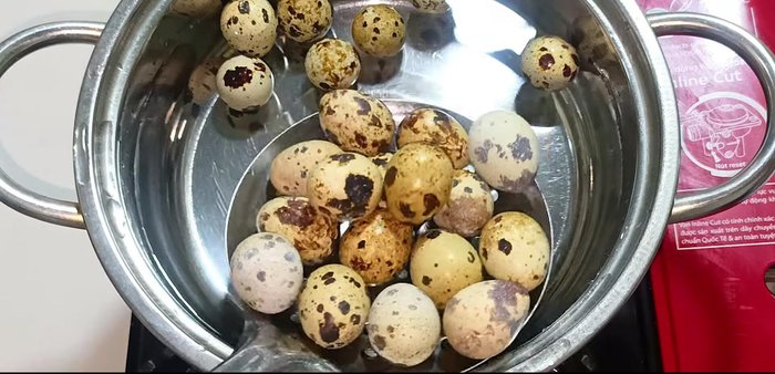 Boil quail eggs for 6 minutes after water boils. Then, remove and soak in cold water to cool.
