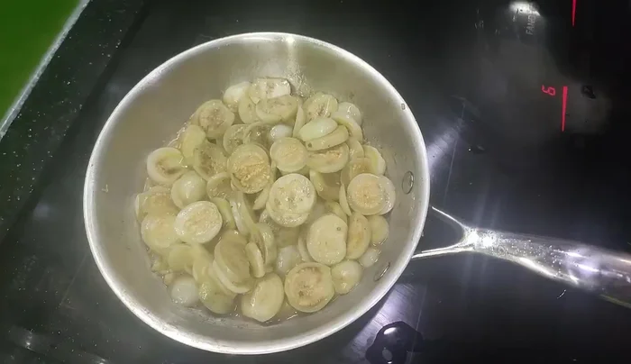 Add a little water to help cook the eggplant.