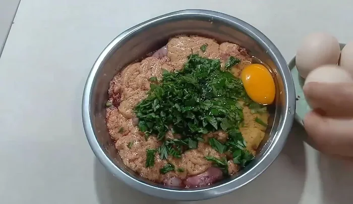 Crack the eggs into a bowl.
