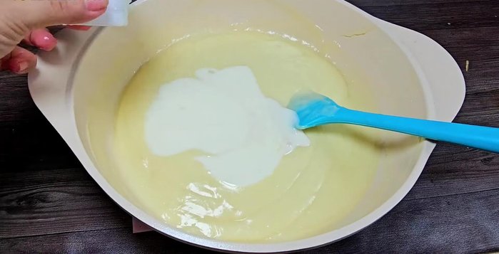 Once cooled, gently stir in the 6 boxes of yogurt.