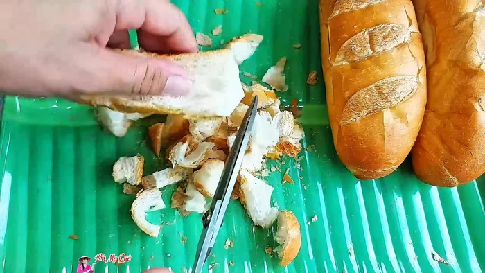 Cut the day-old bread into small pieces. (Note: For best results, use day-old bread that has been refrigerated overnight to make it drier and easier to crush.)