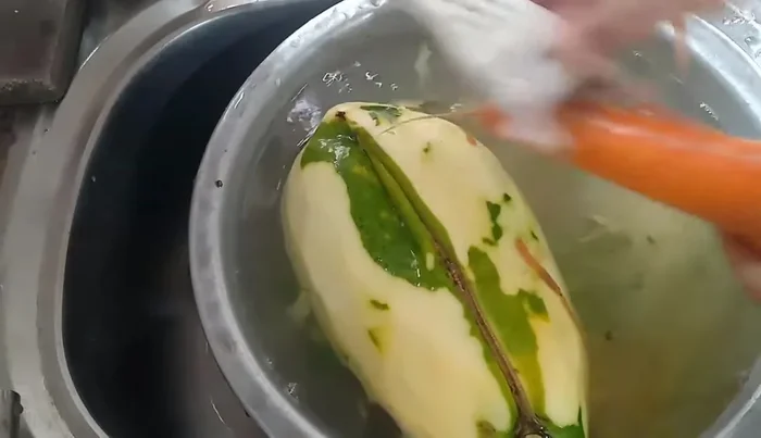 Grate the carrots.