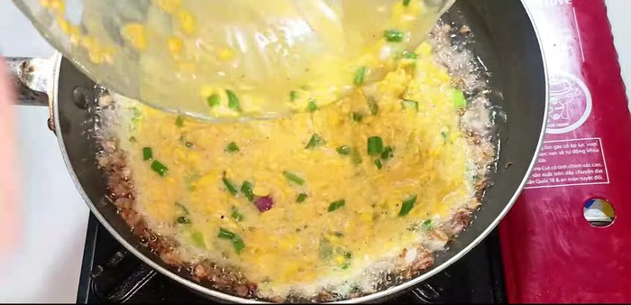 Add the egg and corn mixture to the pan. Reduce heat to low and stir quickly to combine everything.