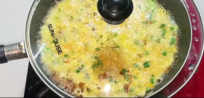 Cover the pan and cook for about 30 seconds. Then, gently rotate the pan to ensure even cooking and a golden-brown bottom. Repeat this process 3-4 times.