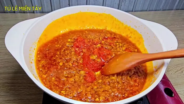 Add the blended chili peppers and stir for another 3 minutes.