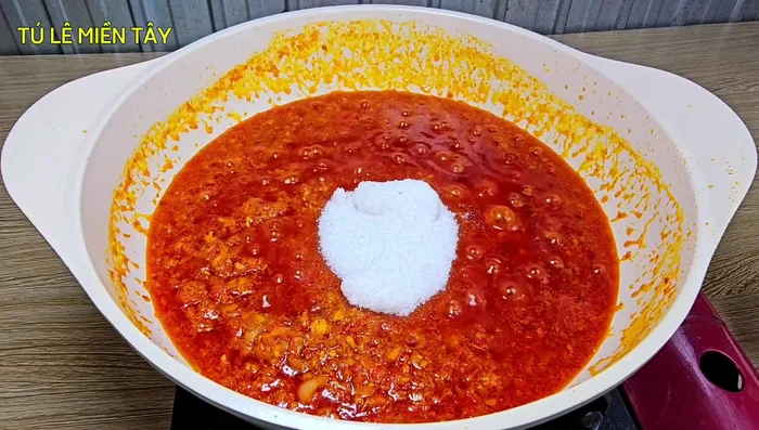 Add the dried chili, sugar, and salt. Stir-fry for 10 minutes on medium heat, stirring occasionally.