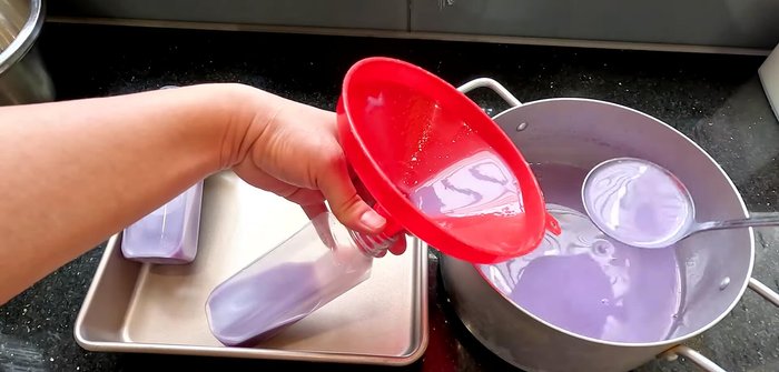 Assemble the dessert: Once cooled, pour the taro jelly into the bottles, tilting the bottle to create a layered look. Then add the coconut milk.