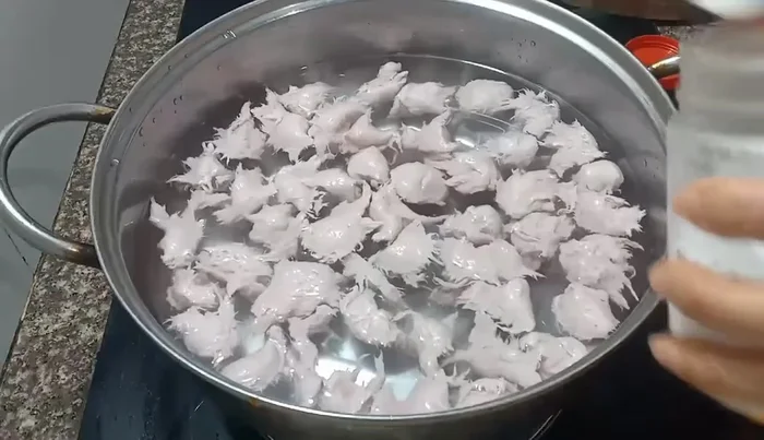 Add spices (salt and pepper) to the pot.