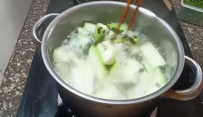Turn off the heat. Add onions and herbs (optional).