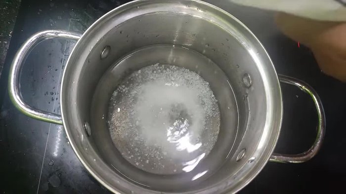 Boil water to create a brine for pickling. Add enough salt to make it saltier than soup and a little sugar to speed up fermentation. Let the brine cool completely to prevent scum formation.