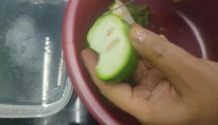 Soak the cut eggplant in a bowl of diluted saltwater (add vinegar or lemon juice if desired) for about 15 minutes to prevent bruising.