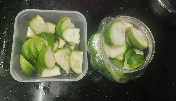 Cover the eggplant completely with the cooled saltwater brine.
