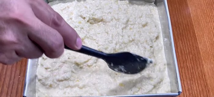 Bake the cake: Pour the cassava mixture into the prepared pan and spread evenly. Bake at 180°C (350°F) for 80-100 minutes, or until the top is golden brown. Check at 60-70 minutes.