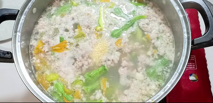 Reduce heat to low. Season with seasoning powder, sugar, salt, MSG, fish sauce, and ground pepper. Stir to dissolve.