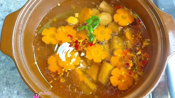 Season the soup: Add sugar, vegetarian seasoning, and green chilies. Simmer for about 10 more minutes.
