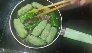 Soft & Delicious Grilled Pork Rolls with Betel Leaves: No Splatter!