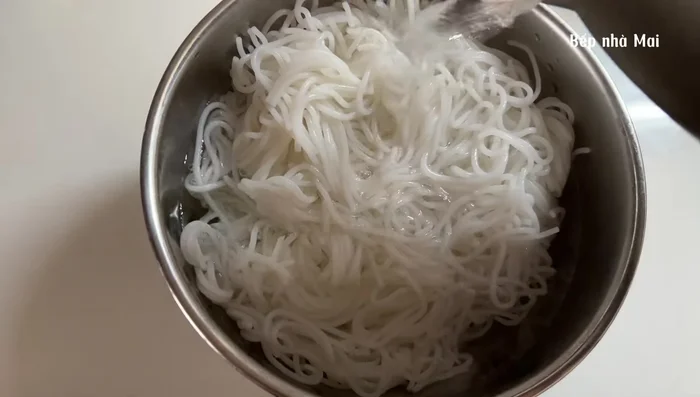 Boil rice noodles until cooked; drain before adding to broth. Alternatively, add directly to broth if preferred.