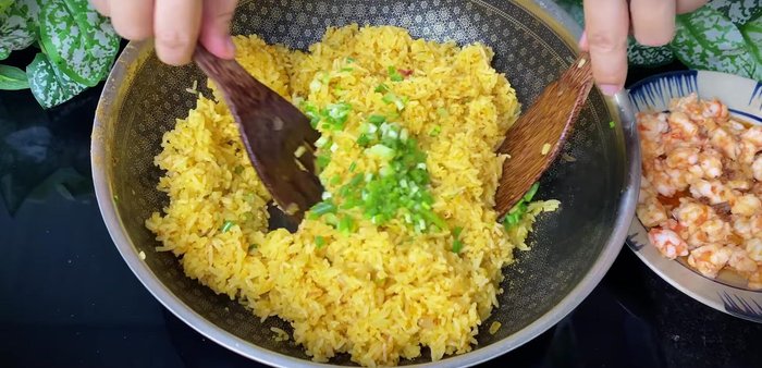 Add green onions and remove from heat.
