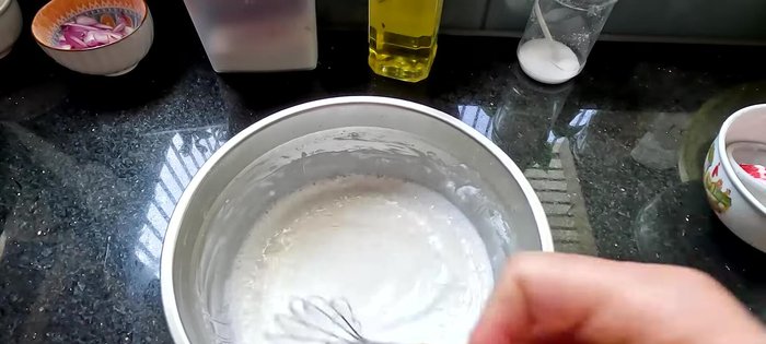 Add oil to the batter: Add a tablespoon of cooking oil to the batter and stir well.