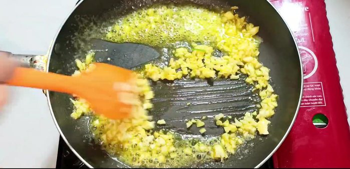 Sauté chopped garlic until fragrant and golden brown, but avoid burning. (209.92)