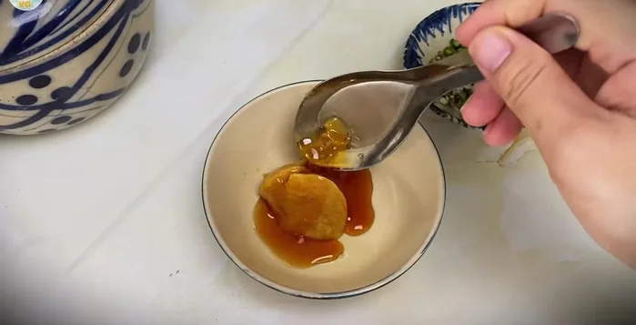 Prepare dipping sauce: Mix palm sugar, fish sauce, and lemon juice until dissolved. Add chili peppers.