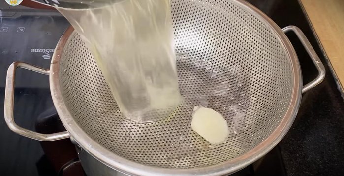 Strain the cooking liquid from the pressure cooker, reserving the broth. Discard the vegetables.