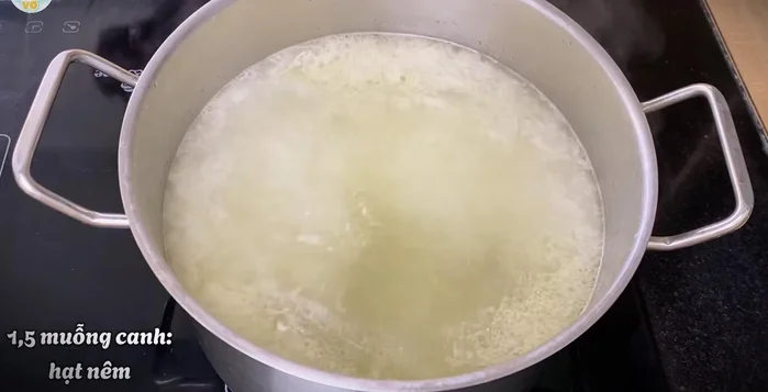In a pot, bring the broth to a boil. Add seasoning powder, rock sugar, and salt. Simmer until spices dissolve.