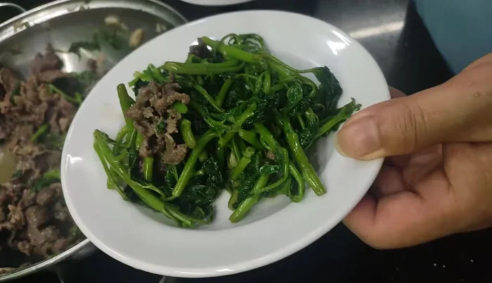 Garnish with buffalo meat on top and vegetables underneath.