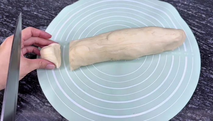 Roll out the dough: Roll out the rested dough thinly and use a bowl or cup to cut out circles.