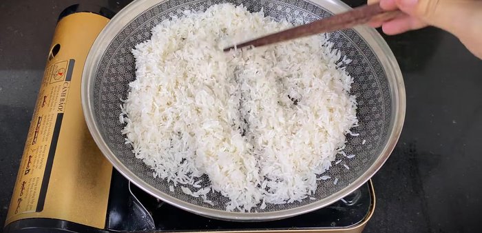 Roast rice until golden brown.