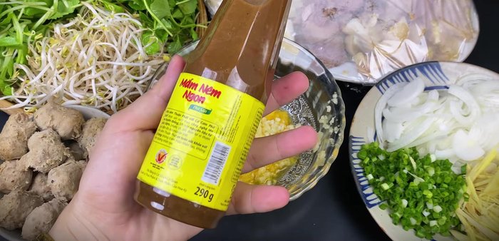 Prepare dipping sauce: Mix fish sauce, sugar, minced garlic, and pineapple.