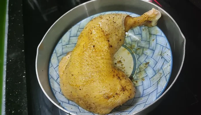 Steam the chicken until cooked (approximately 20-30 minutes for thighs, check for doneness).