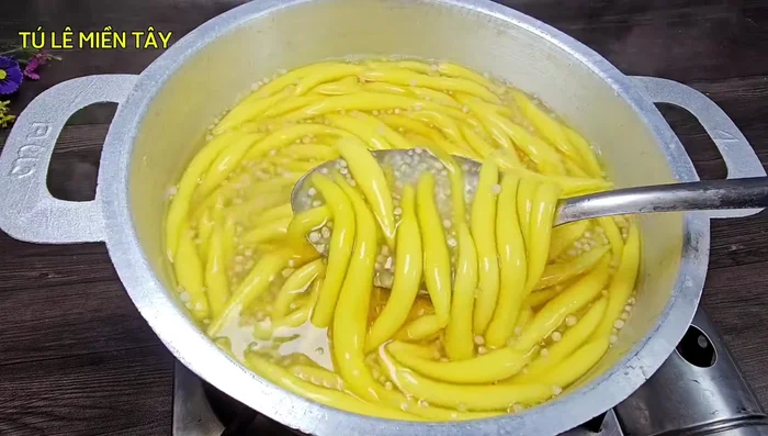 Stir in the coconut milk and vanilla extract. Cook until boiling, then remove from heat. [395.68]