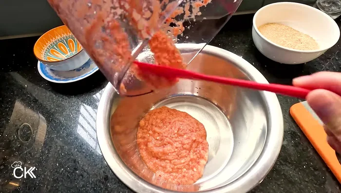 In a bowl, combine the blended mixture with shrimp paste, sugar, lemon juice (70-80ml), and water.